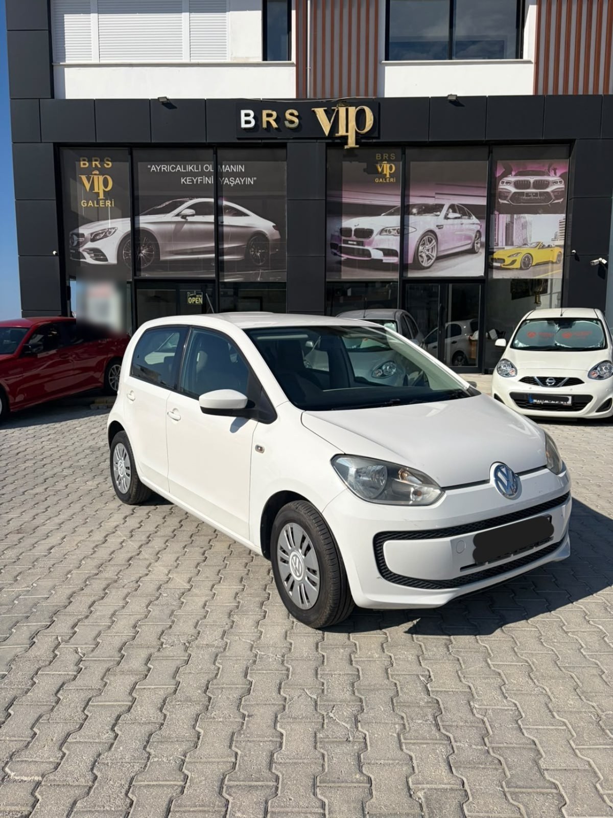 Volkswagen Up Club 1.0 · 2014 · 151.000 km